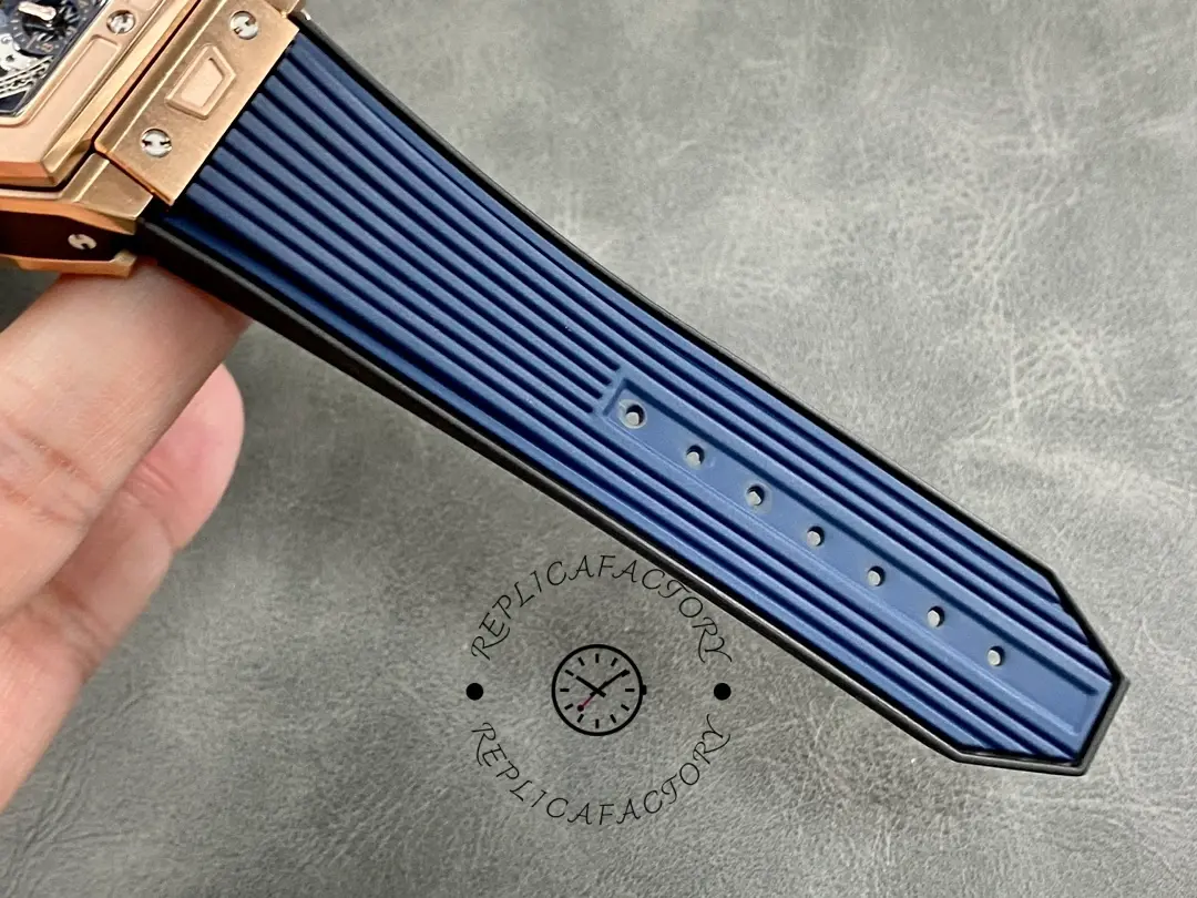 Strap close-up of Hublot Spirit of Big Bang 642.OX.7180.RX showing blue strap texture and holes.