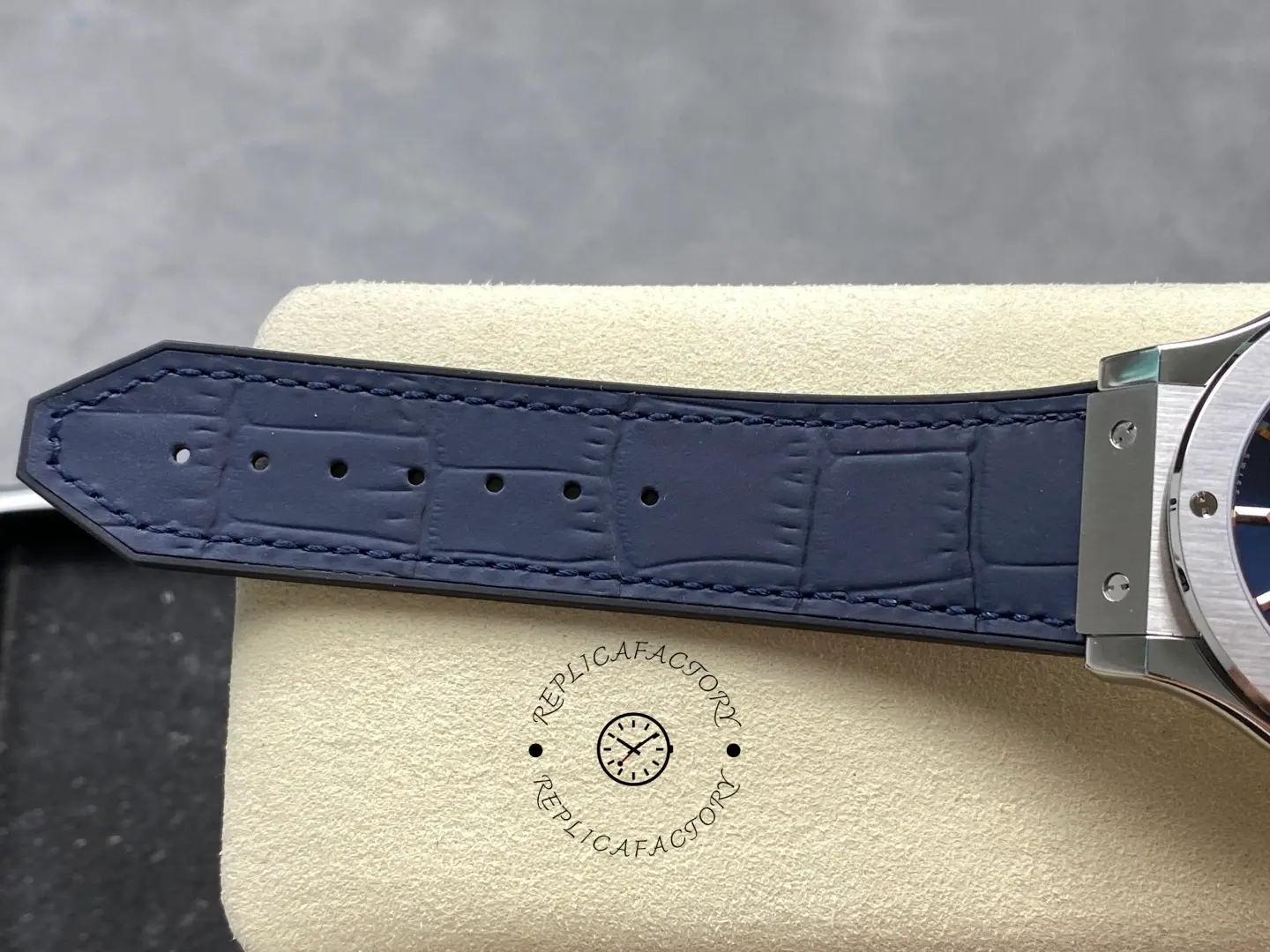 Strap underside detail of Hublot Classic Fusion 542.NX.7170.LR showing embossed lining and stitching.