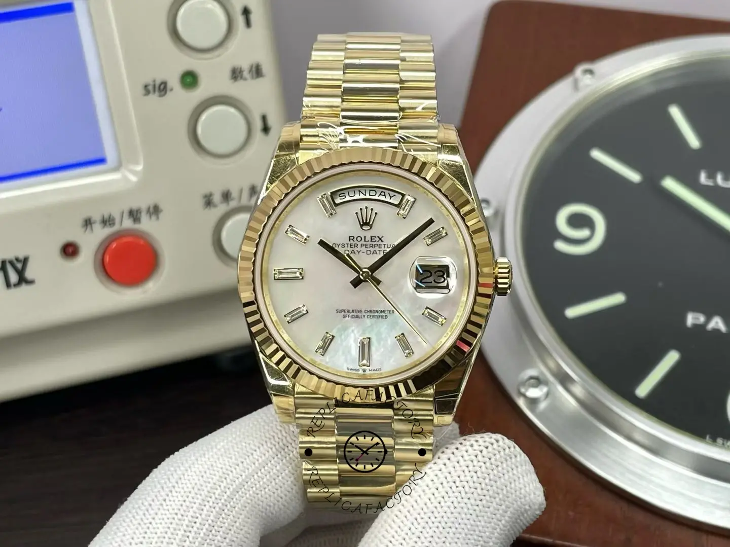 Front view of Rolex Day-Date 40 M228238-0071 with mother of pearl dial and yellow gold President bracelet.