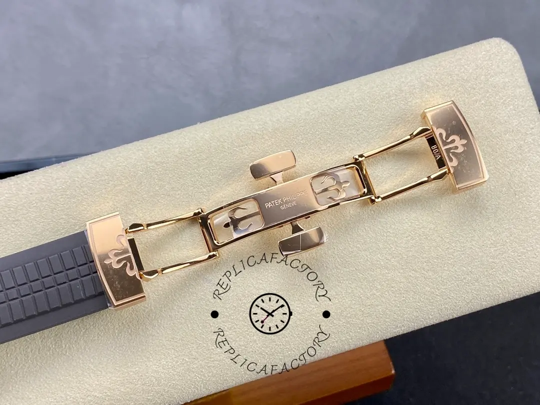 Deployant clasp detail of Patek Philippe Aquanaut 5167R-001 showing clasp mechanism and engraving.