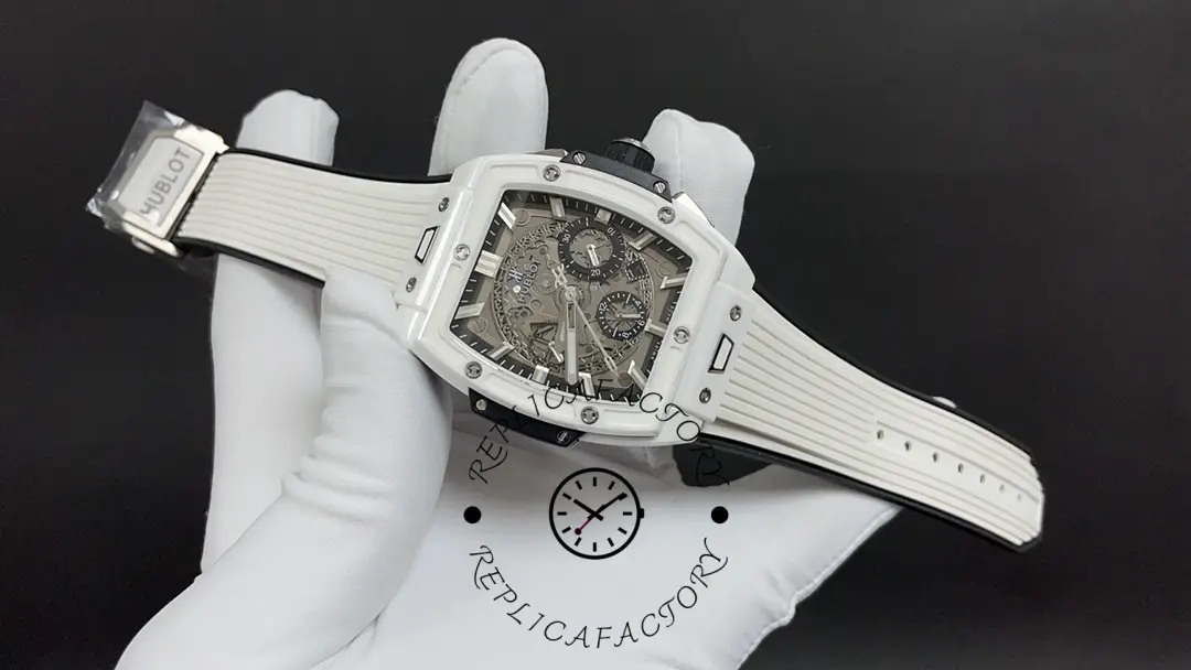 Full strap display of Hublot Spirit of Big Bang 642.HX.0170.RX showing white rubber strap and deployant clasp.
