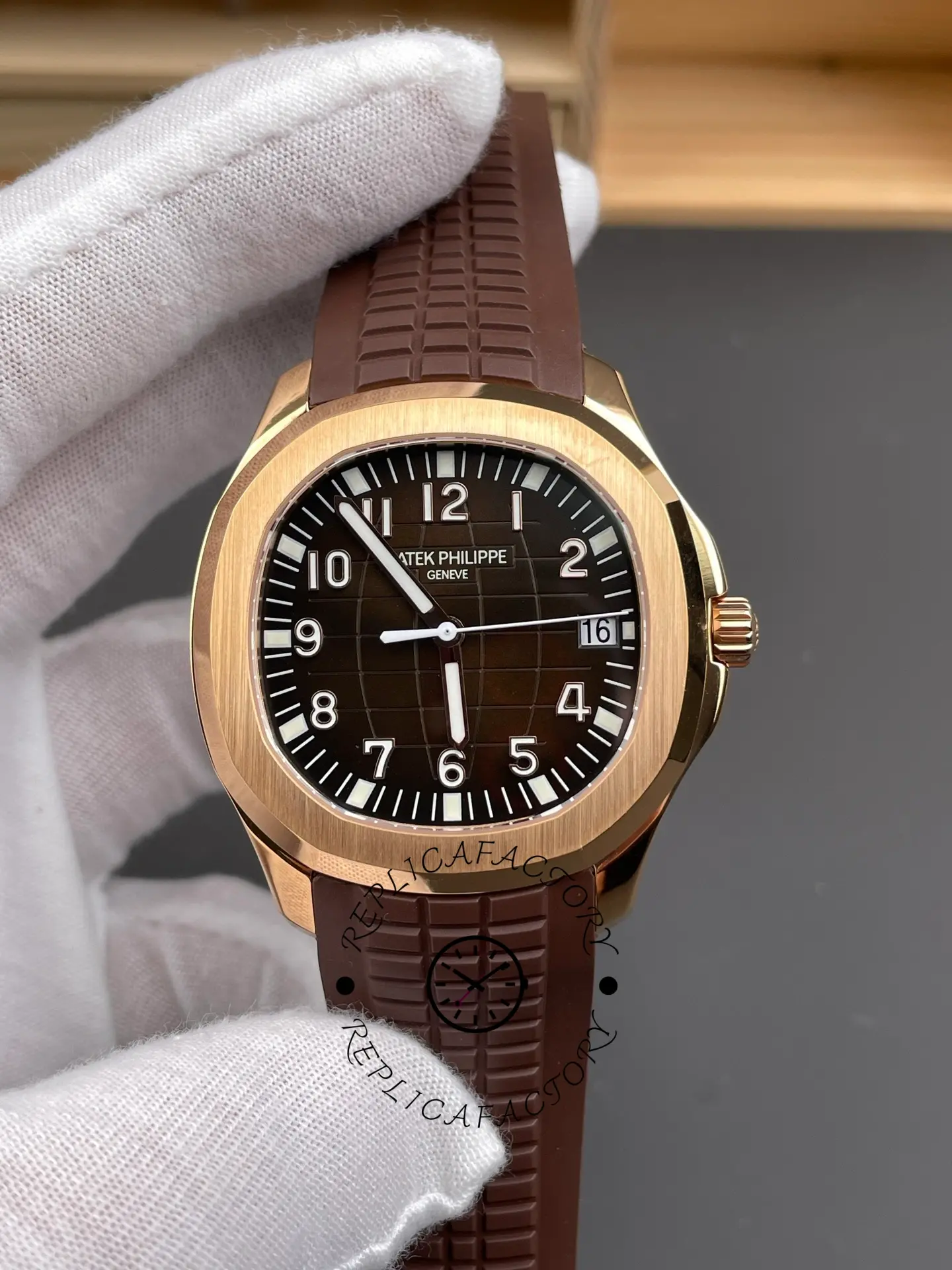 Patek Philippe Aquanaut 5167R-001 brown dial close-up front view with Arabic numerals and date window