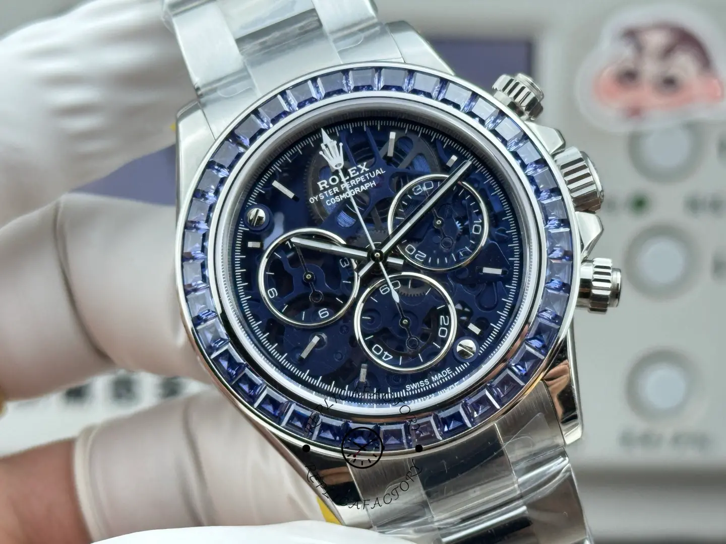 Close front view of Rolex Daytona Arolla Glacier clear dial replica showing blue skeleton-style dial details.