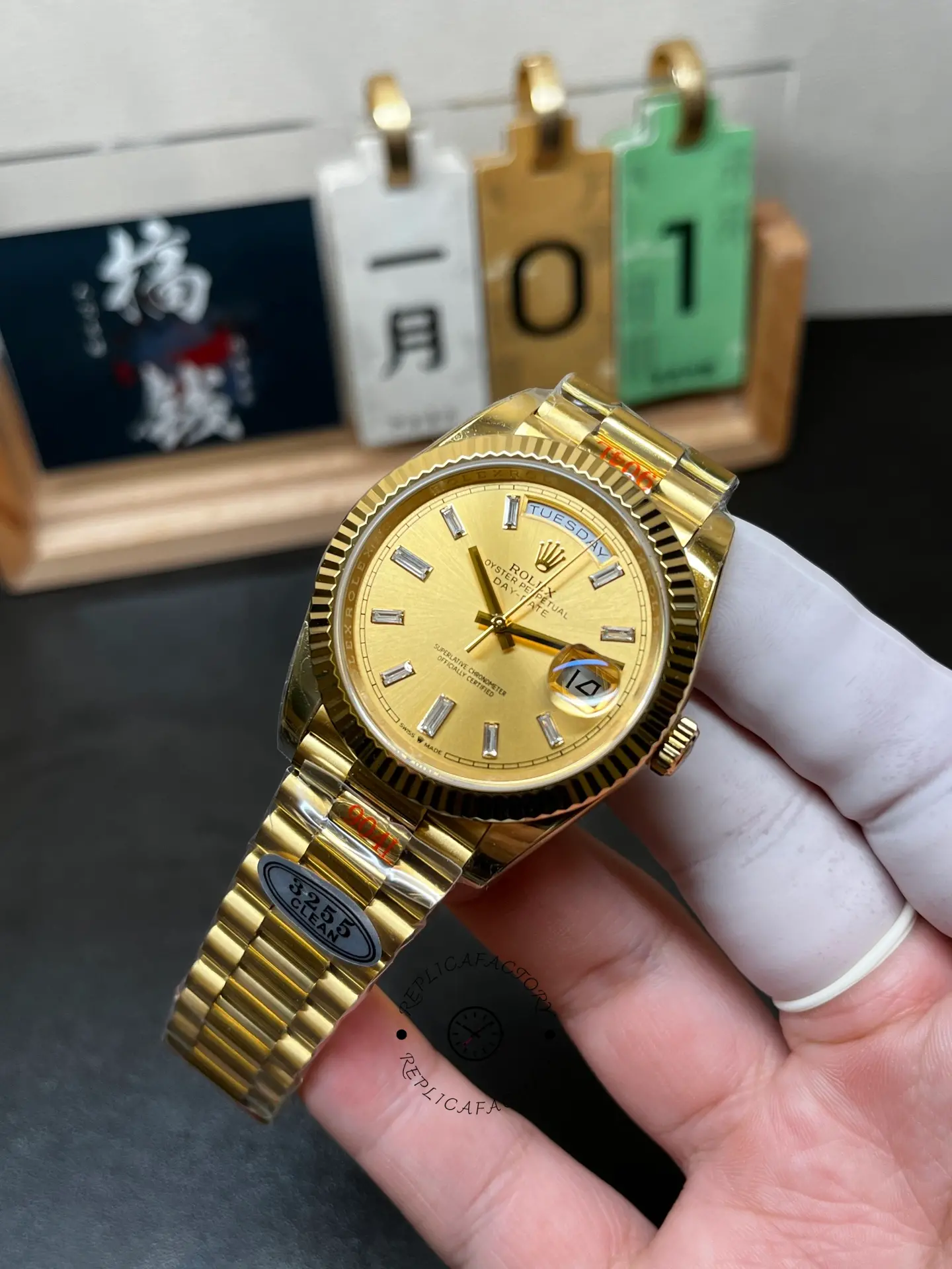 Angled front view of Rolex Day-Date 40 m228238-0005 with champagne dial, fluted bezel and President bracelet.