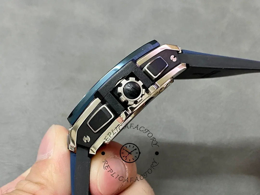 Crown-side view of Hublot 642.NL.7170.RX showing signed crown and chronograph pushers.