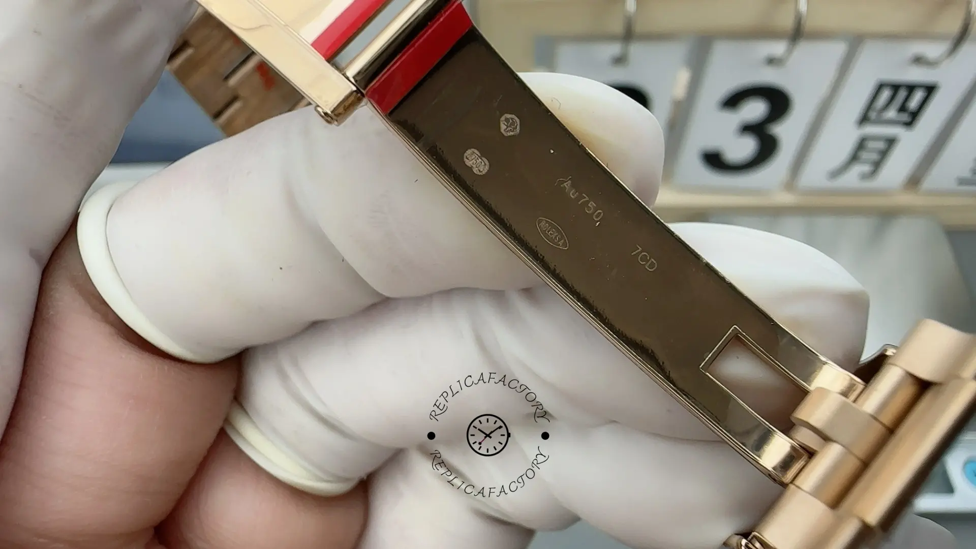 Clasp detail of Rolex 126715CHNR Oyster bracelet with engraved crown logo