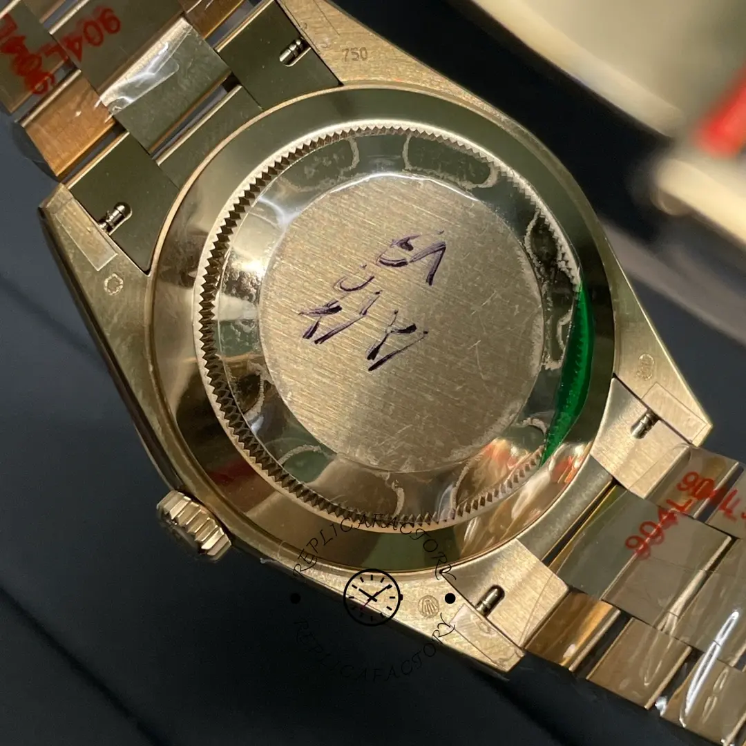 Case back view of Rolex Day-Date 228238 showing the solid back and yellow gold-tone President bracelet.
