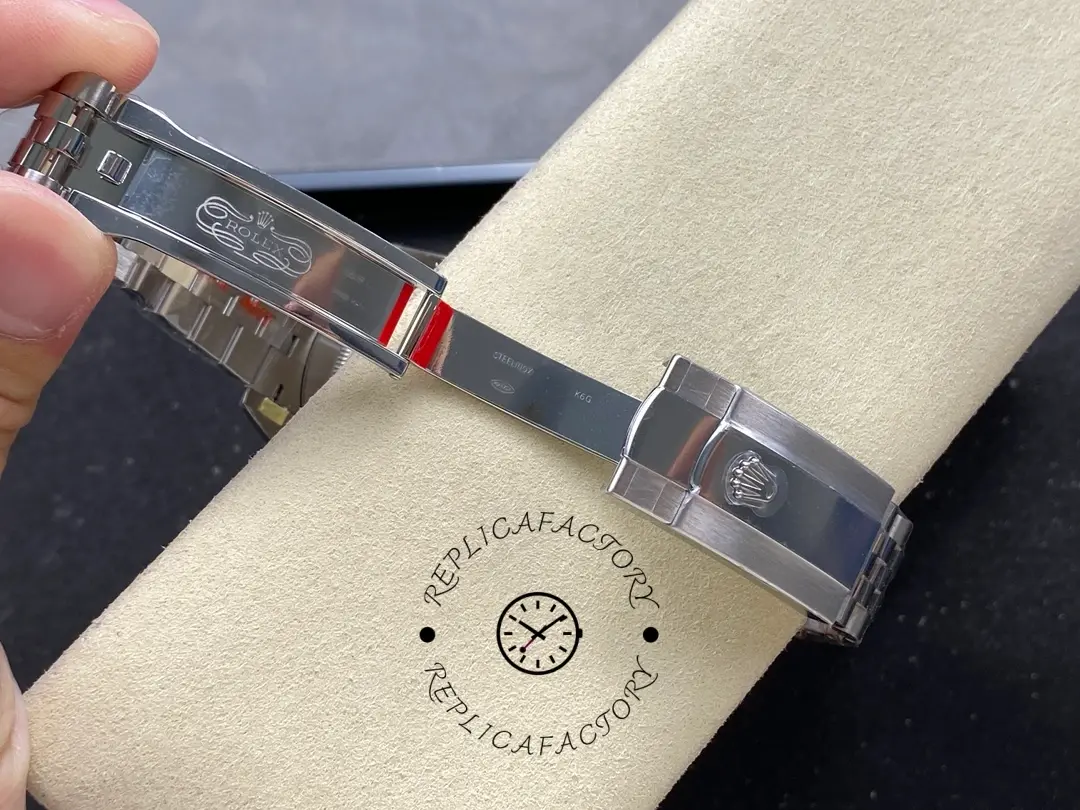 Open clasp view of Rolex Datejust 126334-0022 showing inner clasp engravings and folding mechanism.