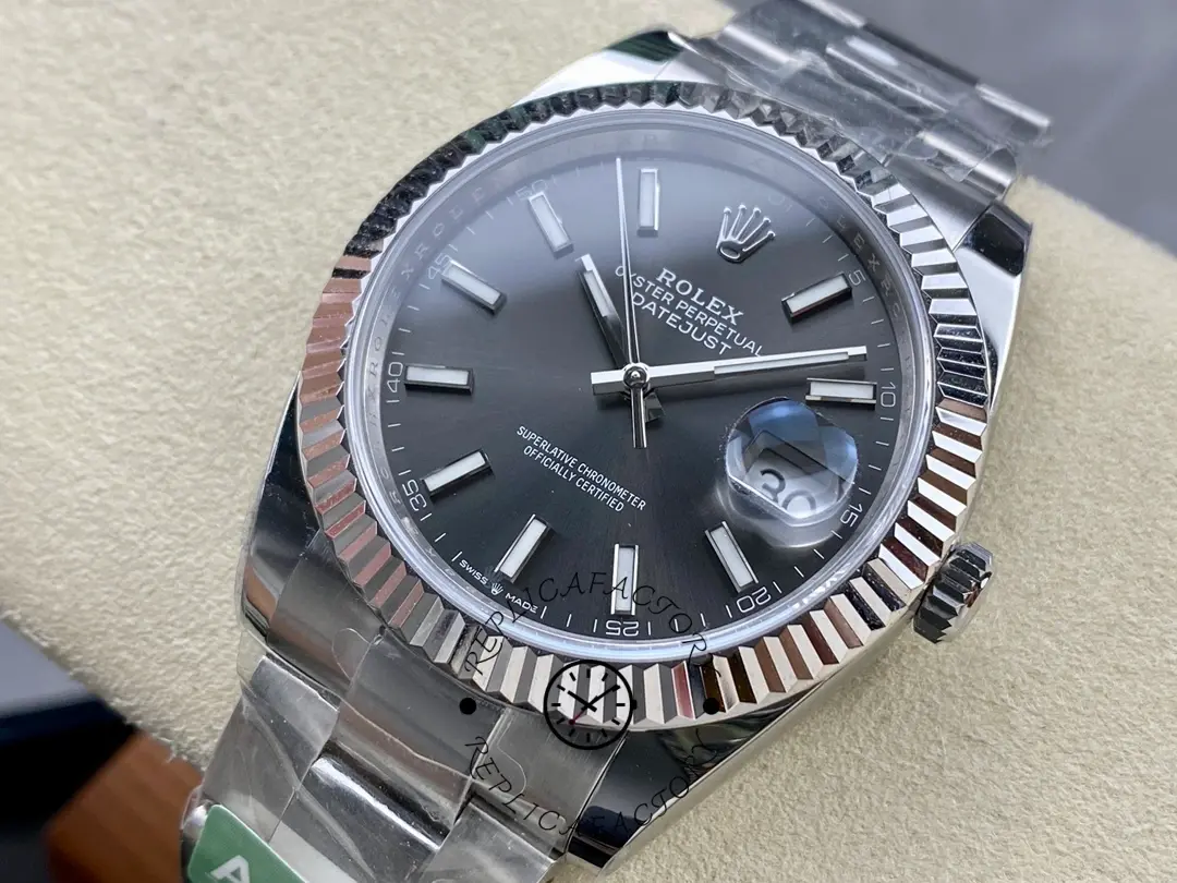 Angled close-up of Rolex Datejust M126334-0013 showing fluted bezel and dial texture.