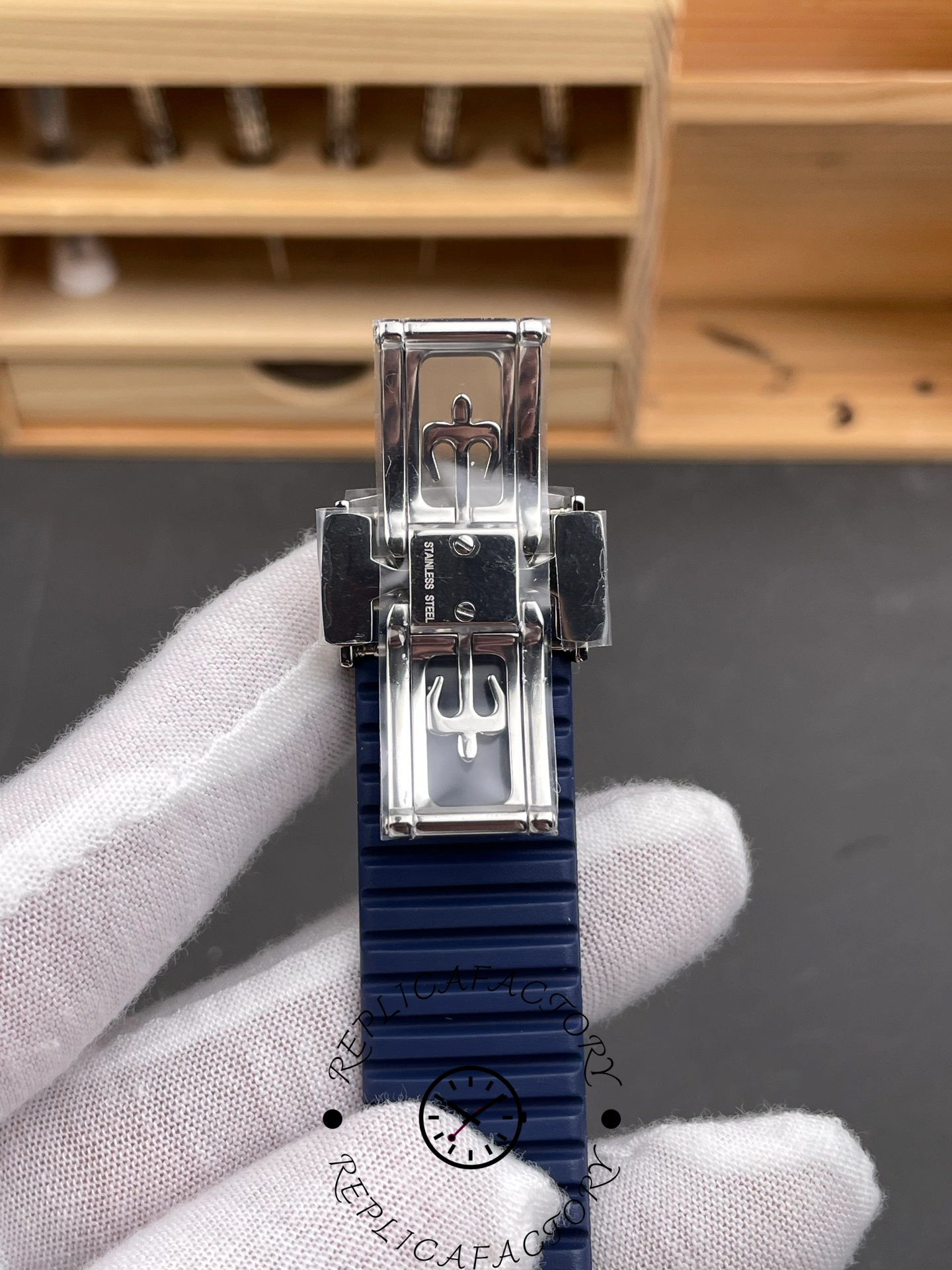 Open clasp of Patek Philippe 5168G-001 1:1 clone showing folding mechanism and steel structure.