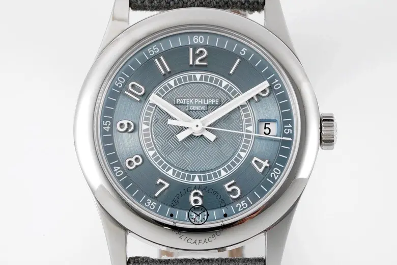 Close-up of the Patek Philippe Calatrava 6007A-001 dial, showing luminous hands and minute track details.