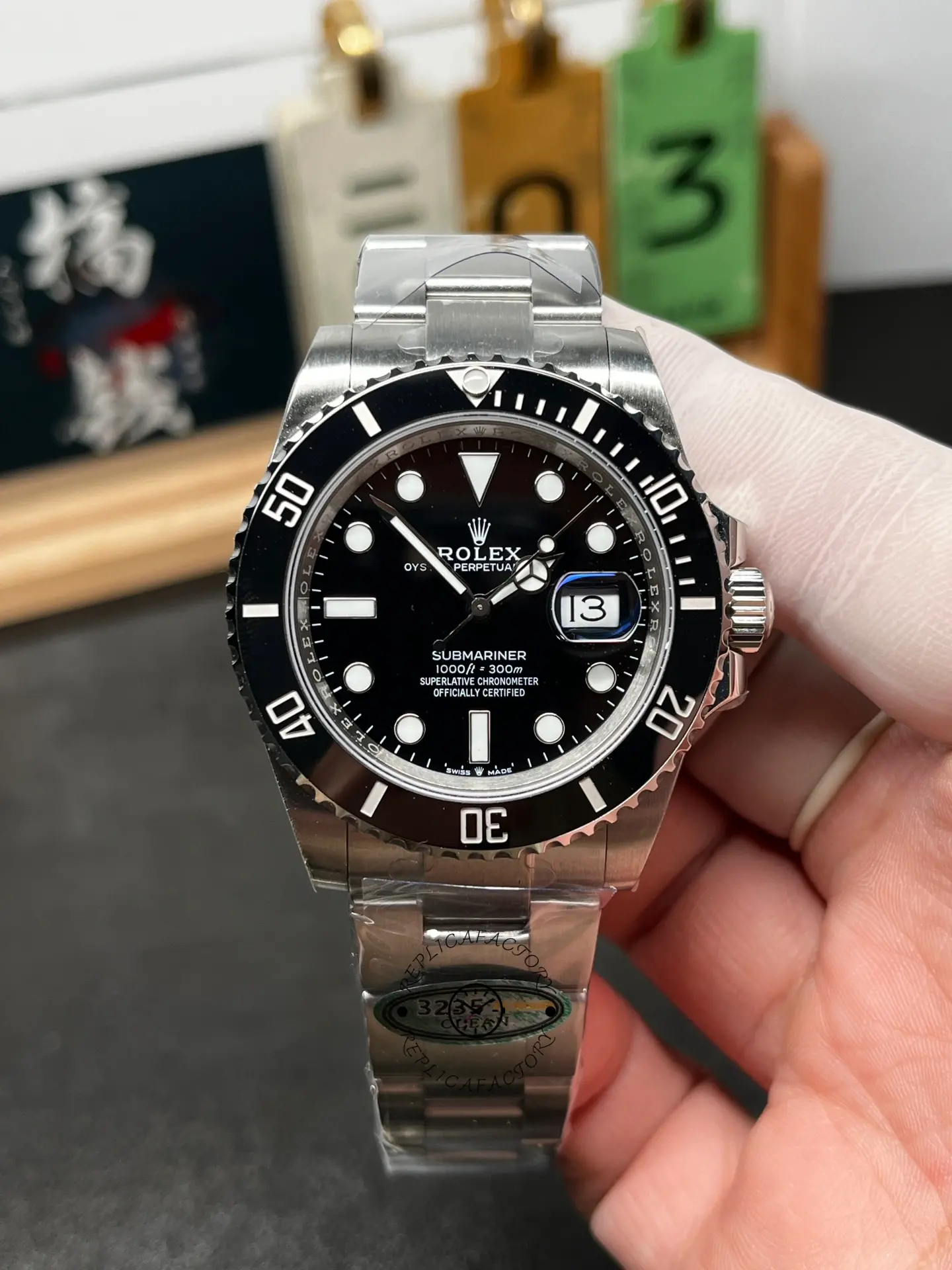 Front close-up of Rolex Submariner 126610LN 0001 showing black dial, luminous markers, and cyclops date.