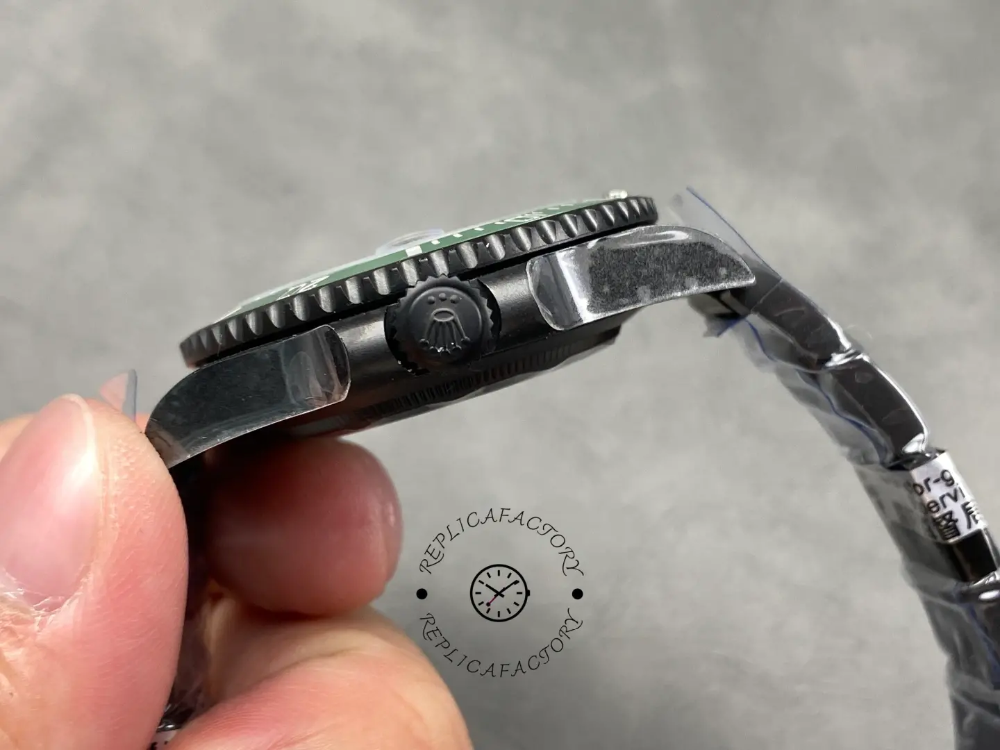 Crown side view of Rolex Submariner 116610LV with screw-down crown and case profile.