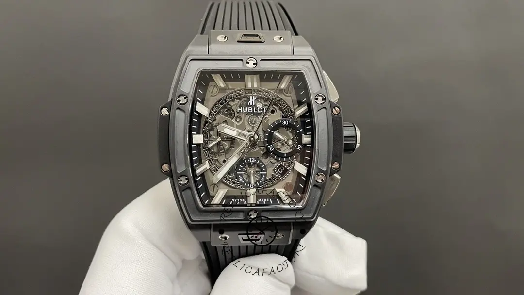 Display stand photo of Hublot 642.CI.0170.RX showing full dial layout and bezel screws.
