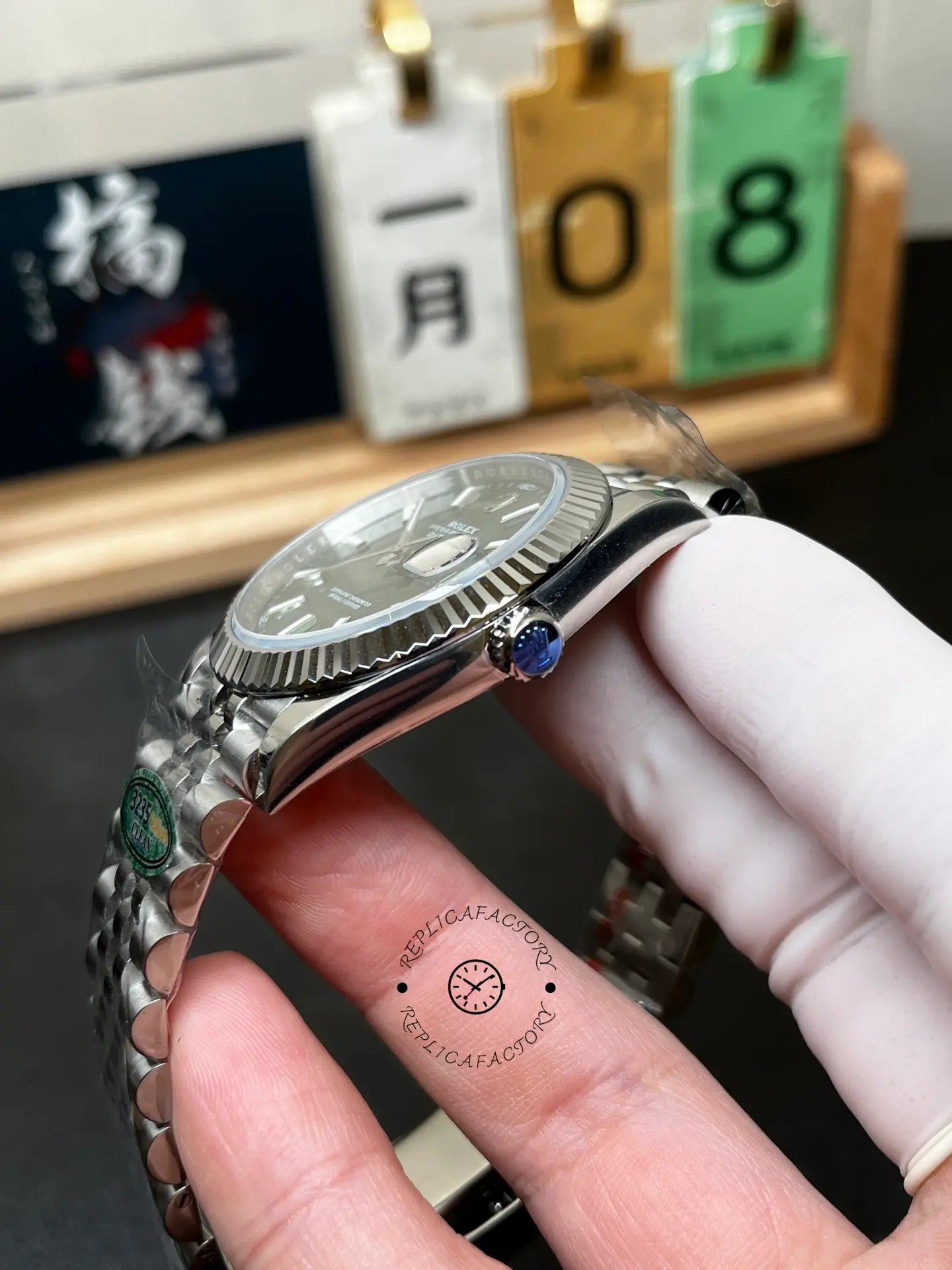 Side view of Rolex Datejust 126334-0028 showing fluted bezel, polished case side and crown profile.