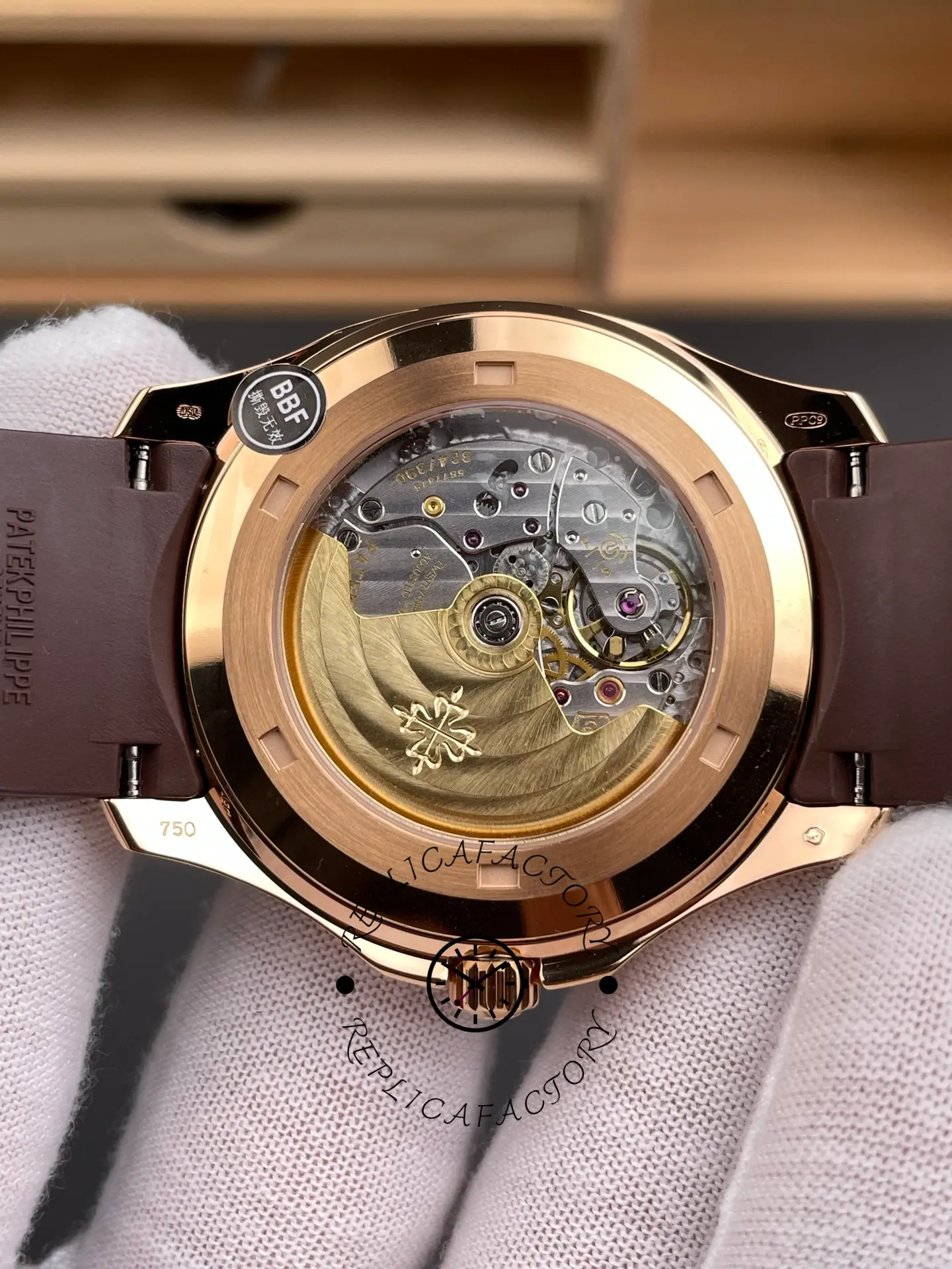 Patek Philippe Aquanaut 5167R-001 exhibition caseback showing automatic movement and rotor