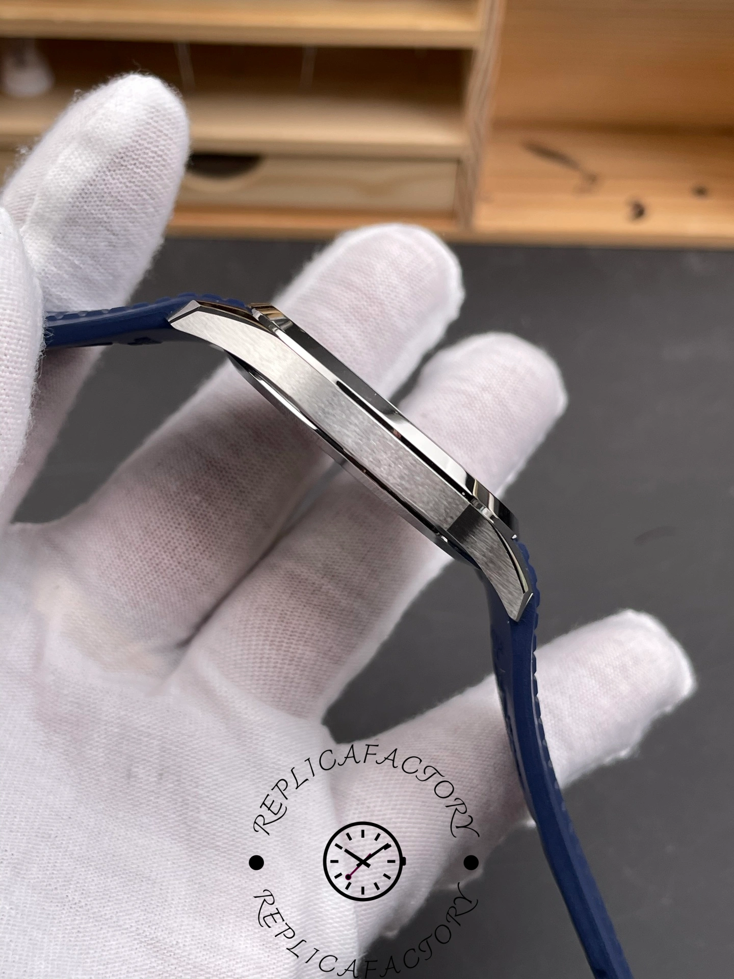 Side profile of Patek Philippe 5168G-001 1:1 clone showing slim case and brushed finish.