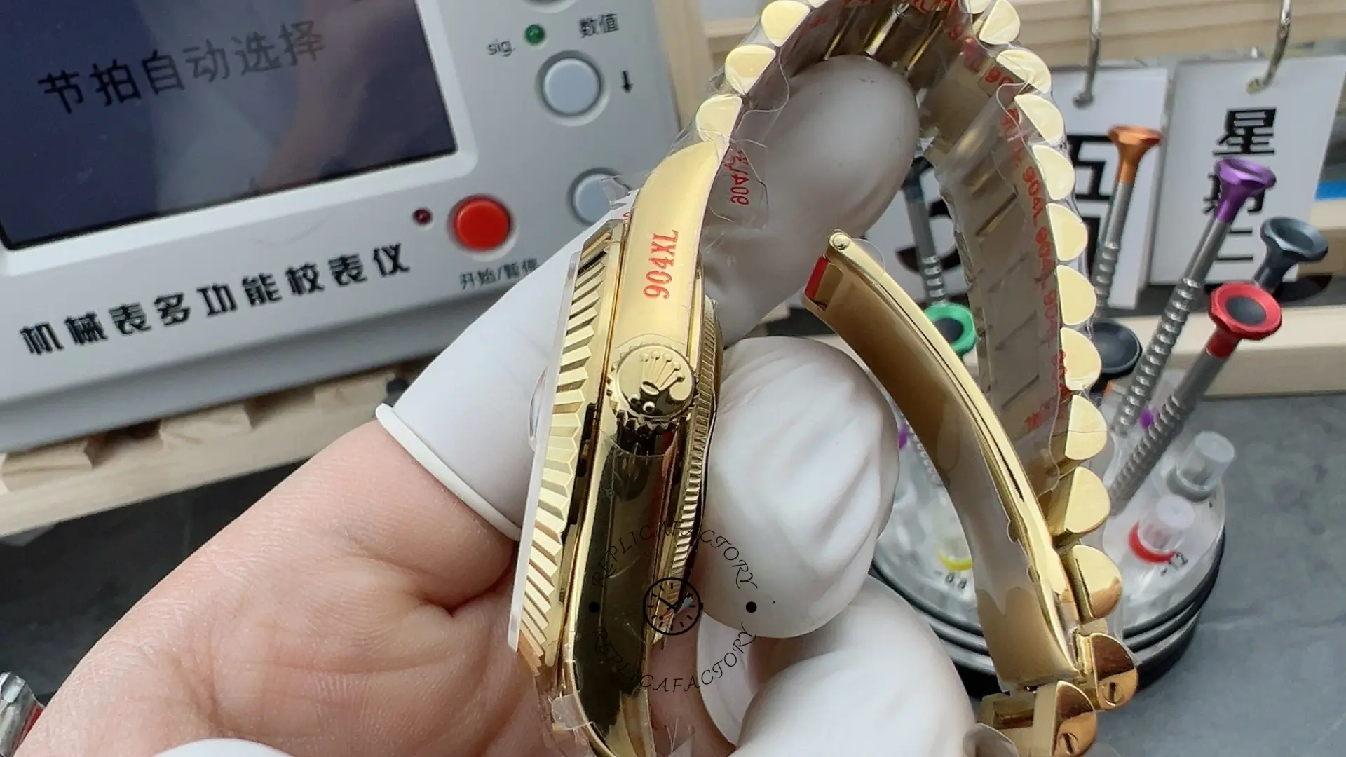 Right side view of Rolex Day-Date 228238 showing crown, fluted bezel and bracelet links.