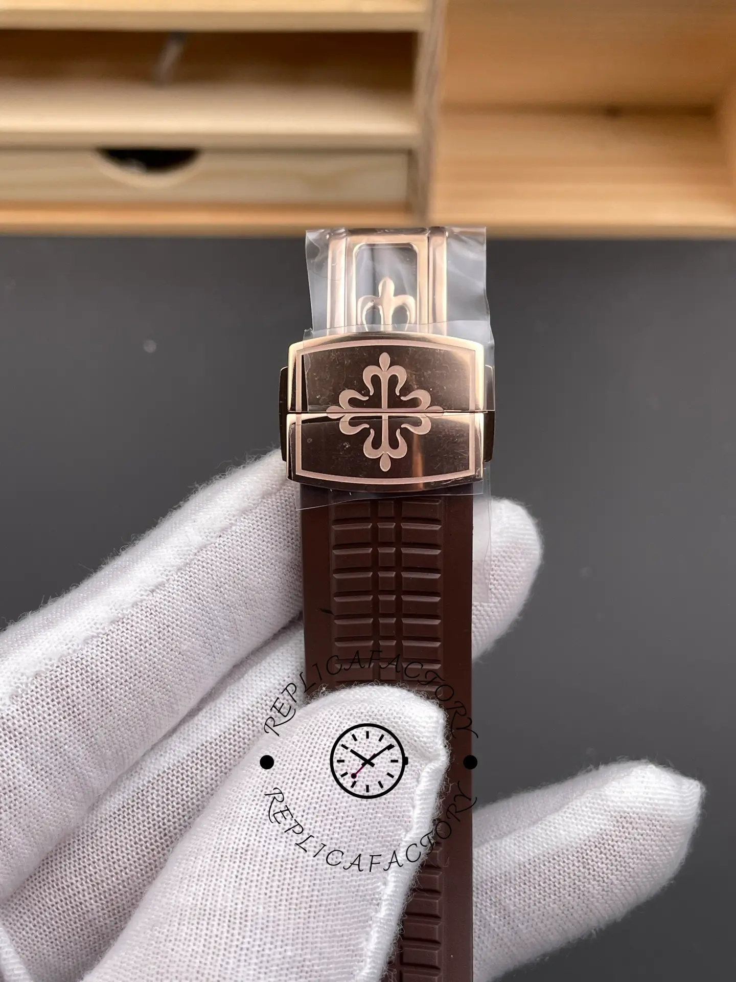 Patek Philippe Aquanaut 5167R-001 rubber strap buckle closed showing rose gold clasp detail