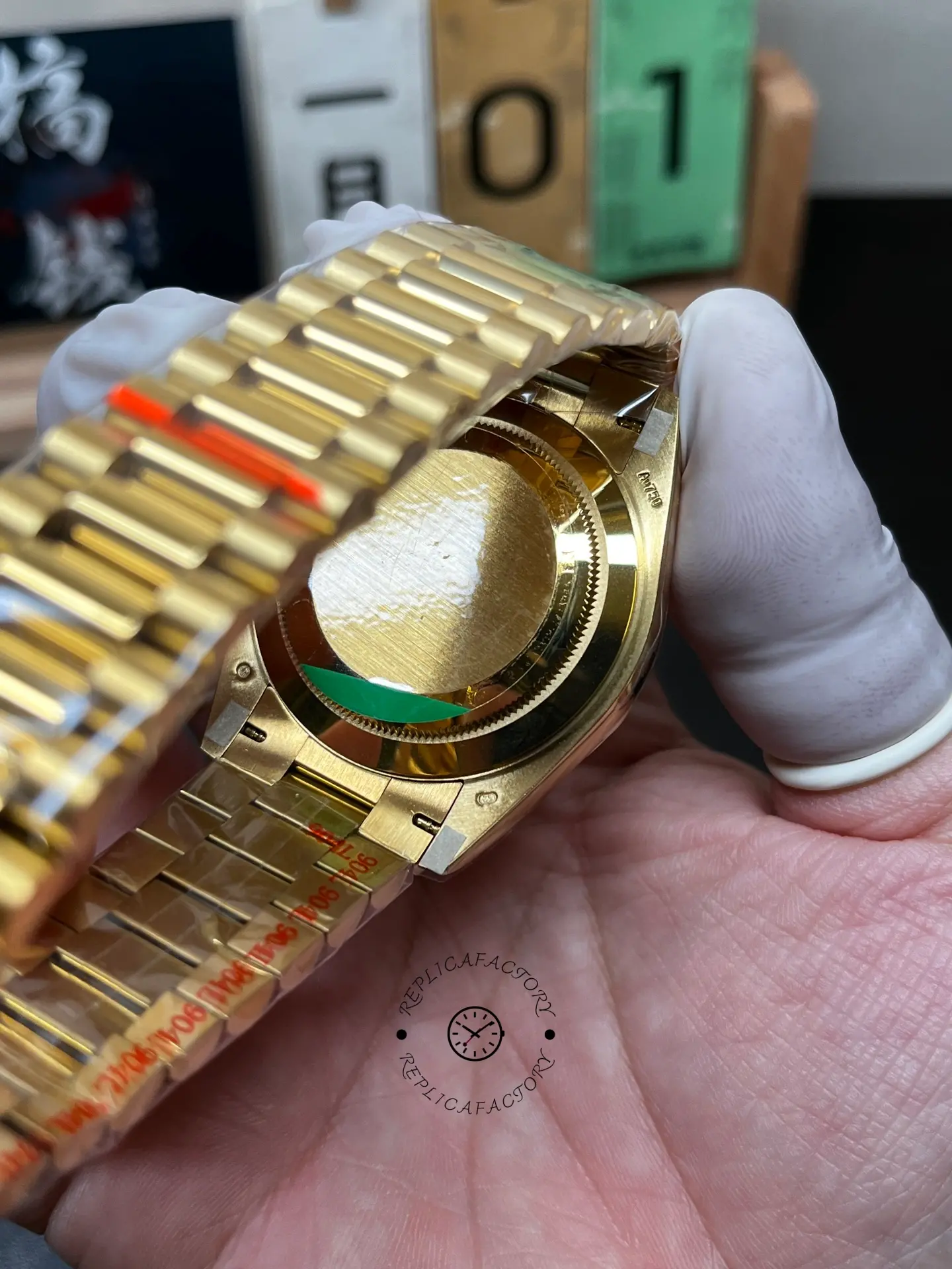 Caseback view of Rolex Day-Date 40 m228238-0005 with closed back and inner side of the President bracelet.