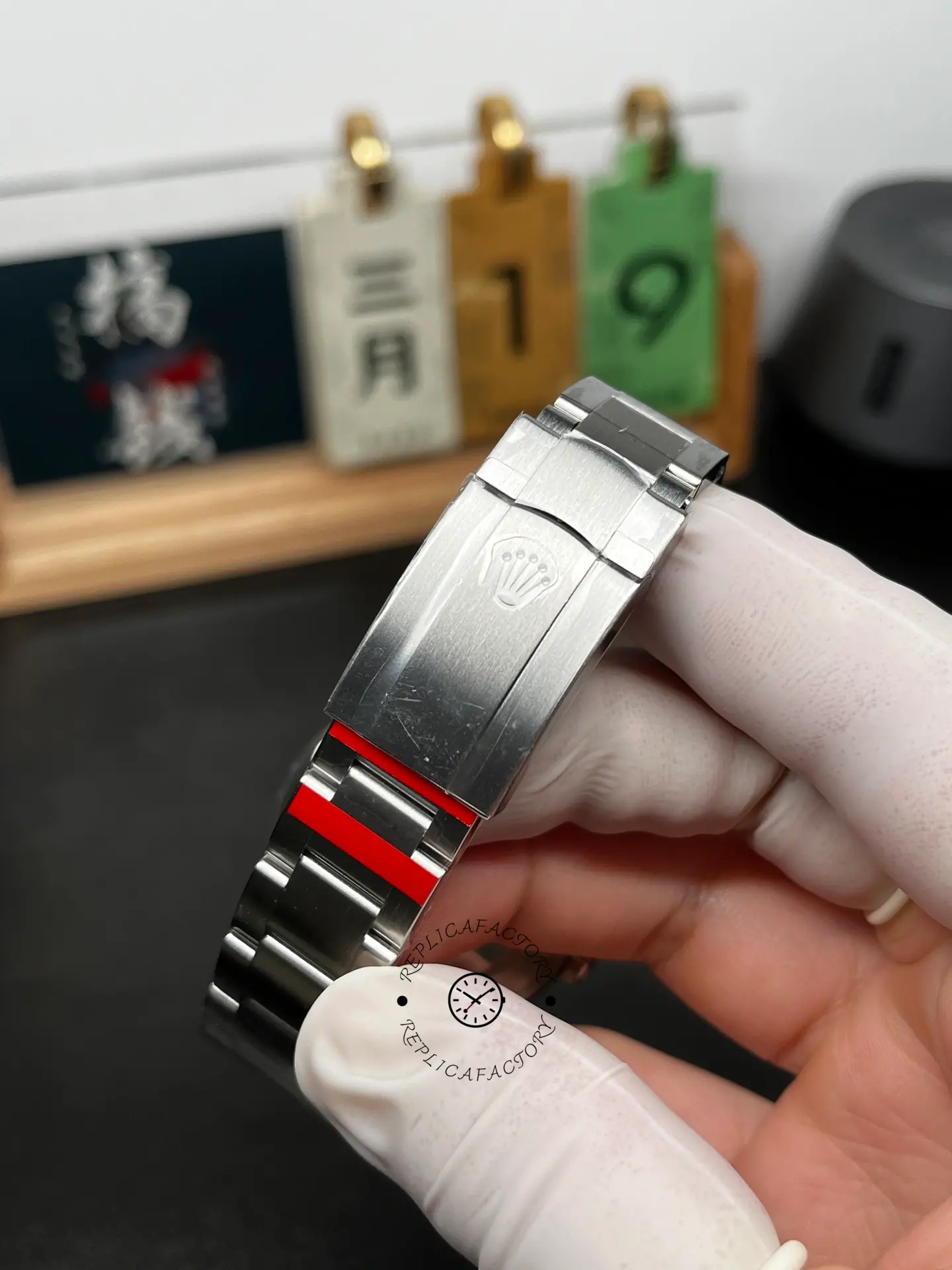 Clasp view of Rolex Oyster Perpetual 41 134300-0004 showing brushed clasp and engraved crown logo.