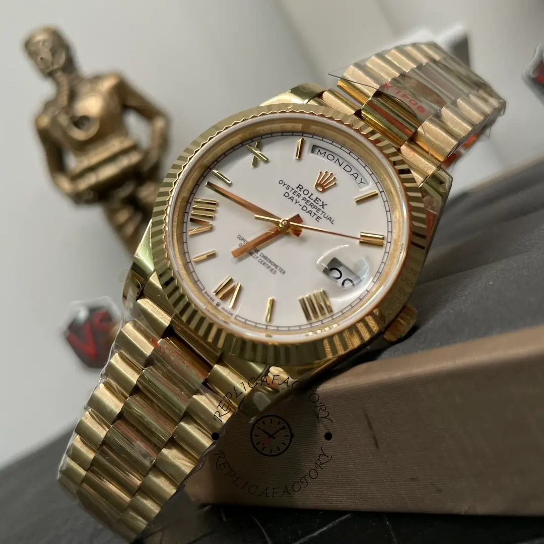 Angled lifestyle shot of Rolex Day-Date 228238 with white dial and President bracelet.