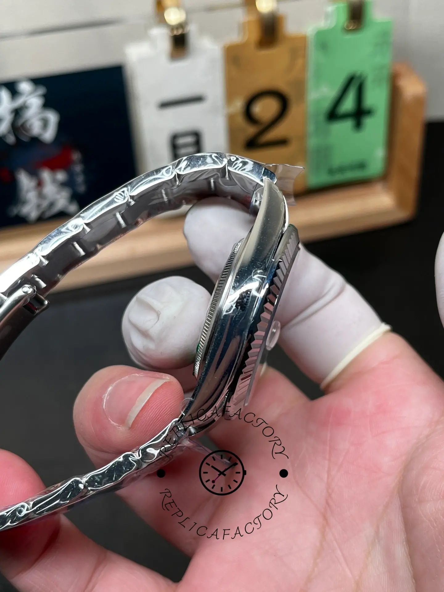 Side angle of Rolex Datejust M126334-0013 showing the crystal, bezel, and case profile.