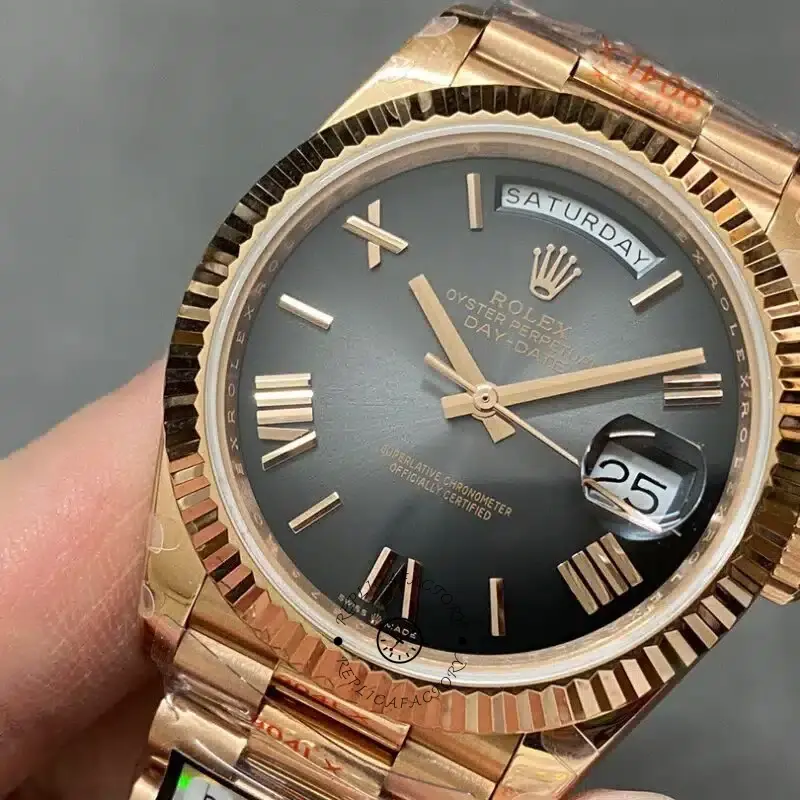 Angled dial detail of Rolex Day-Date 40 M228235-0055 with Roman markers and Cyclops date lens.