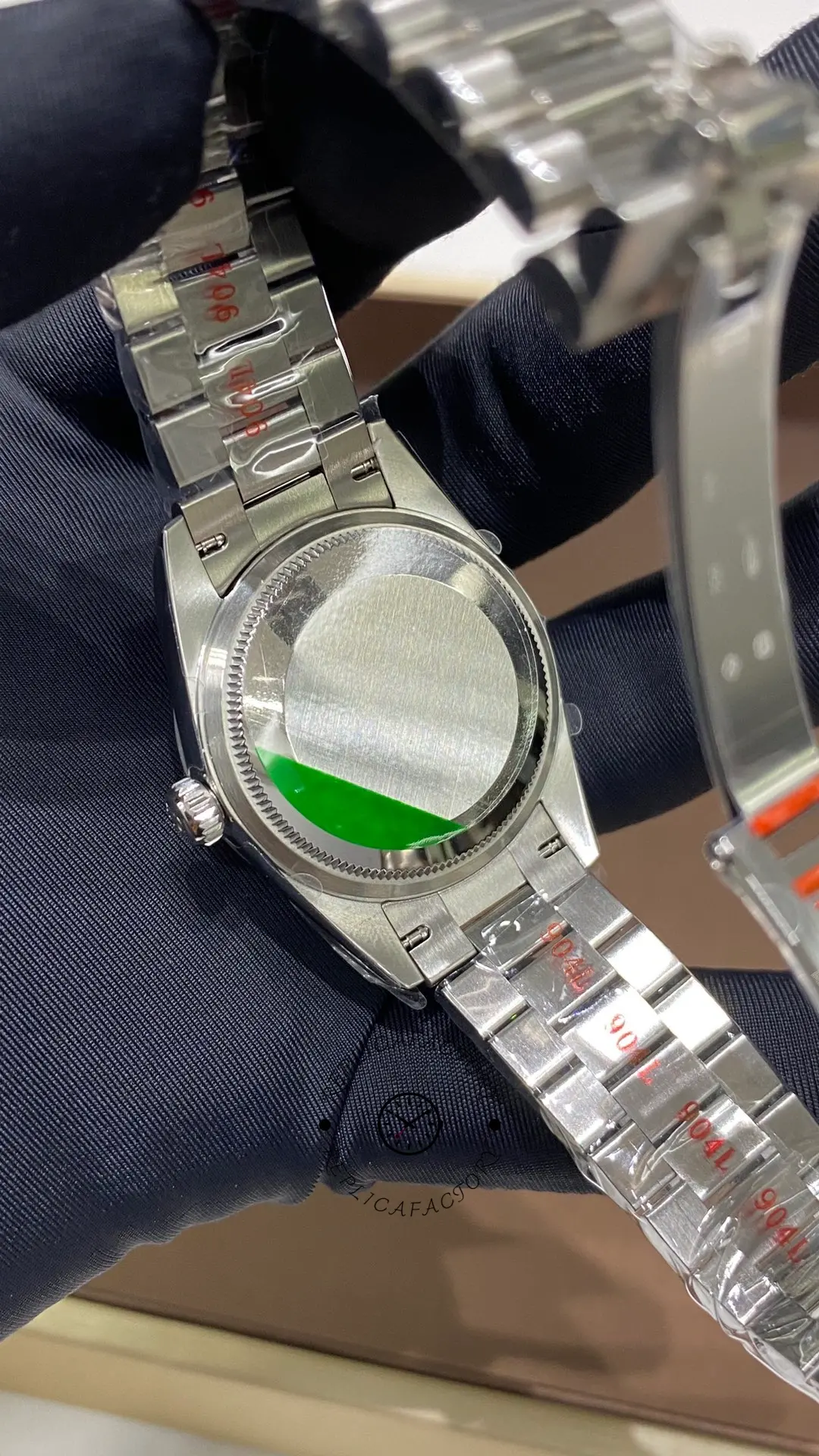 Case back view of Rolex Datejust 31 278289RBR-0028 with solid back and President-style bracelet.