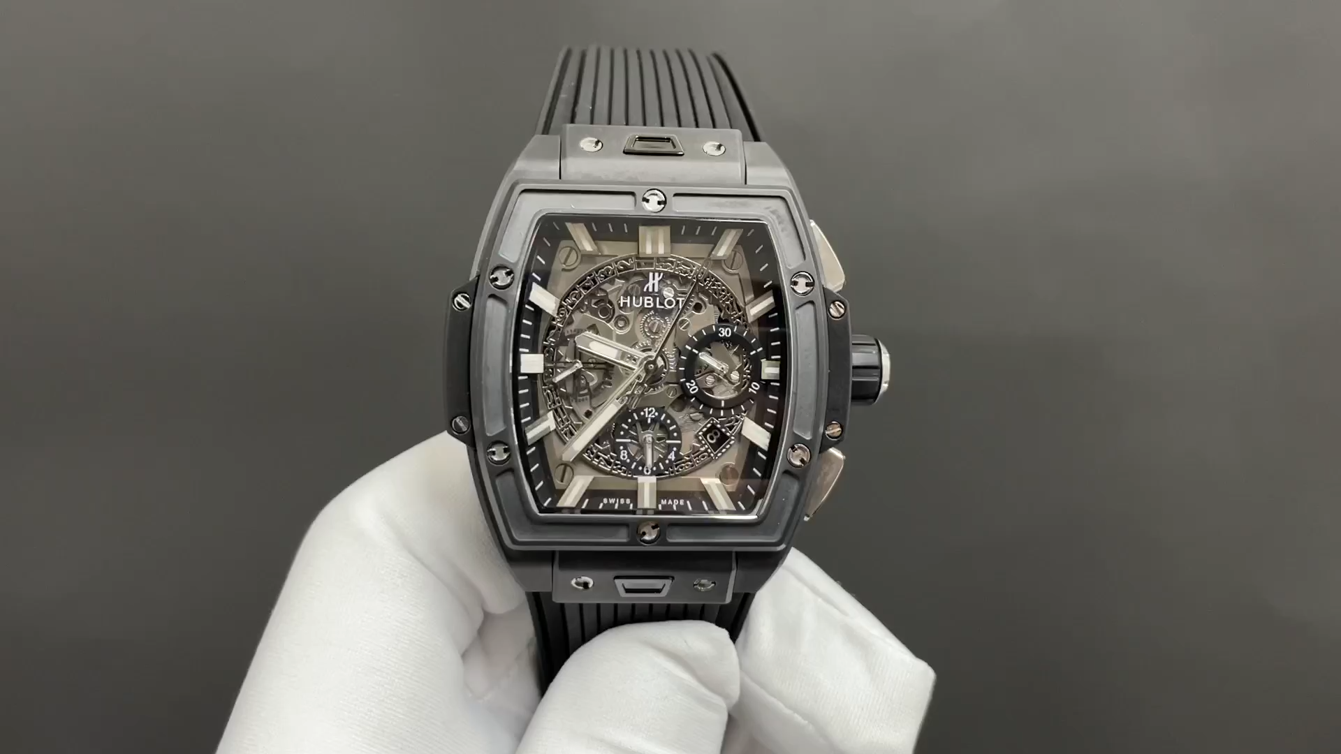 Hand-held view of Hublot 642.CI.0170.RX highlighting case profile and strap curvature during wear. - Video