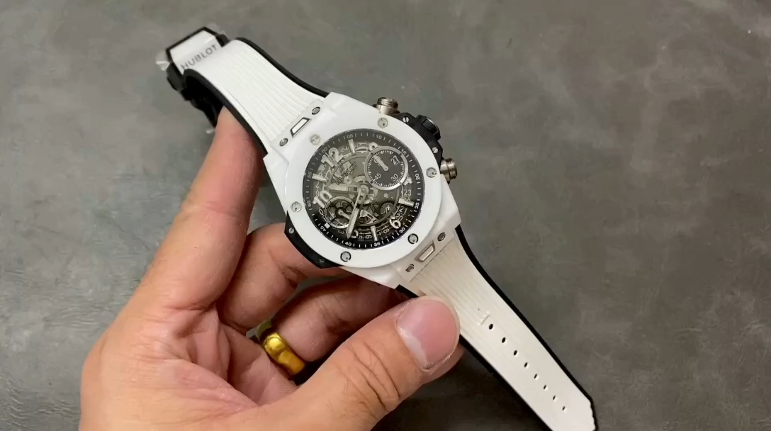 White strap detail of Hublot Big Bang 421.NL.5170.RX showing rubber strap and clasp end. - Video