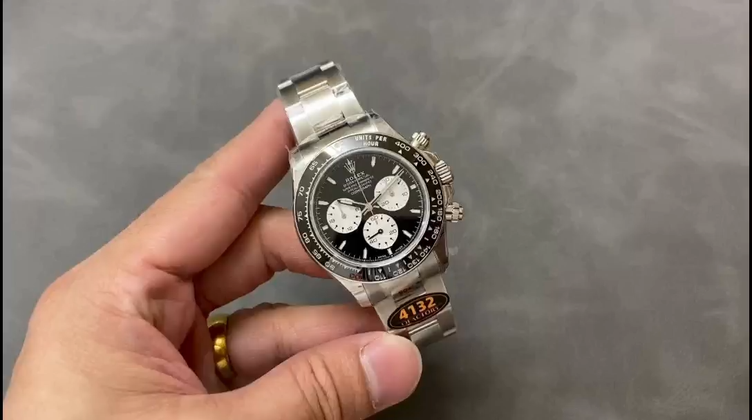 Hand-held video view of the Rolex Daytona 126529LN 40MM, steel bracelet in frame.