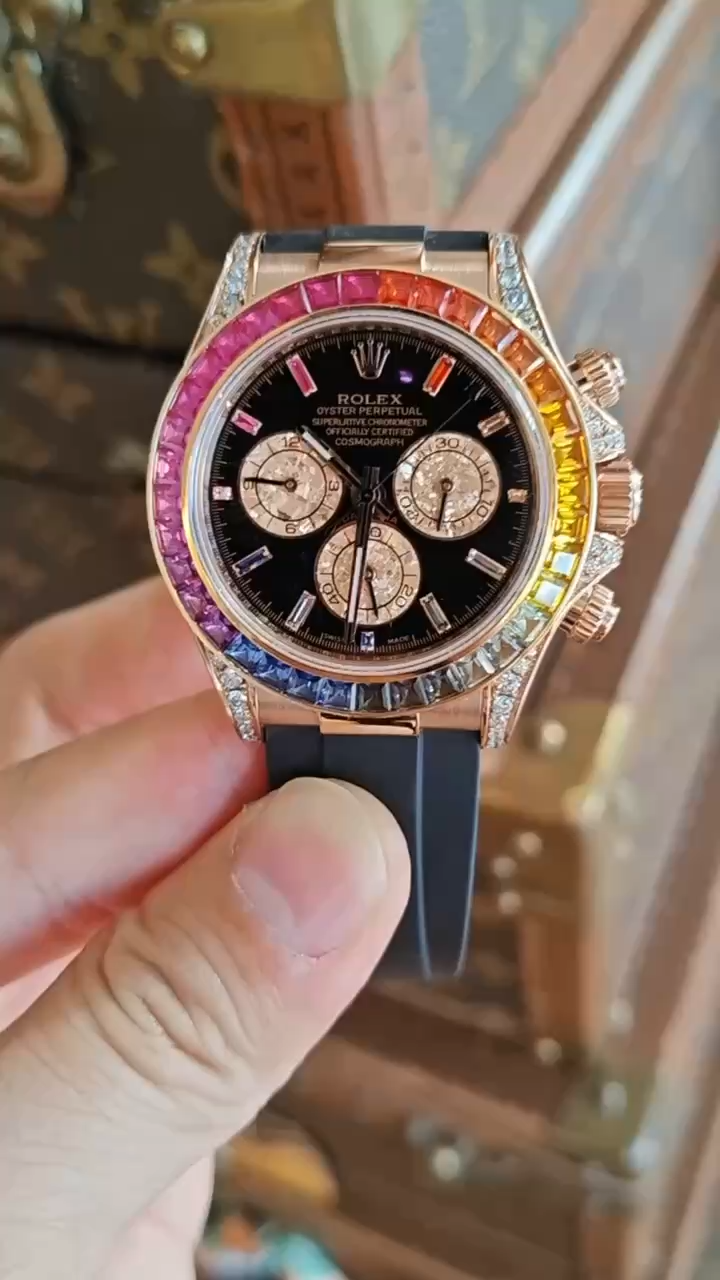 Video of Rolex Daytona 116598RBOW showing rainbow bezel and Oysterflex strap. - Video