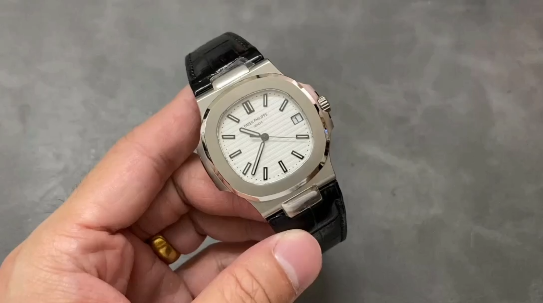Video of the Patek Philippe Nautilus 5711/1A, hand-held rotation showing dial and case profile. - Video