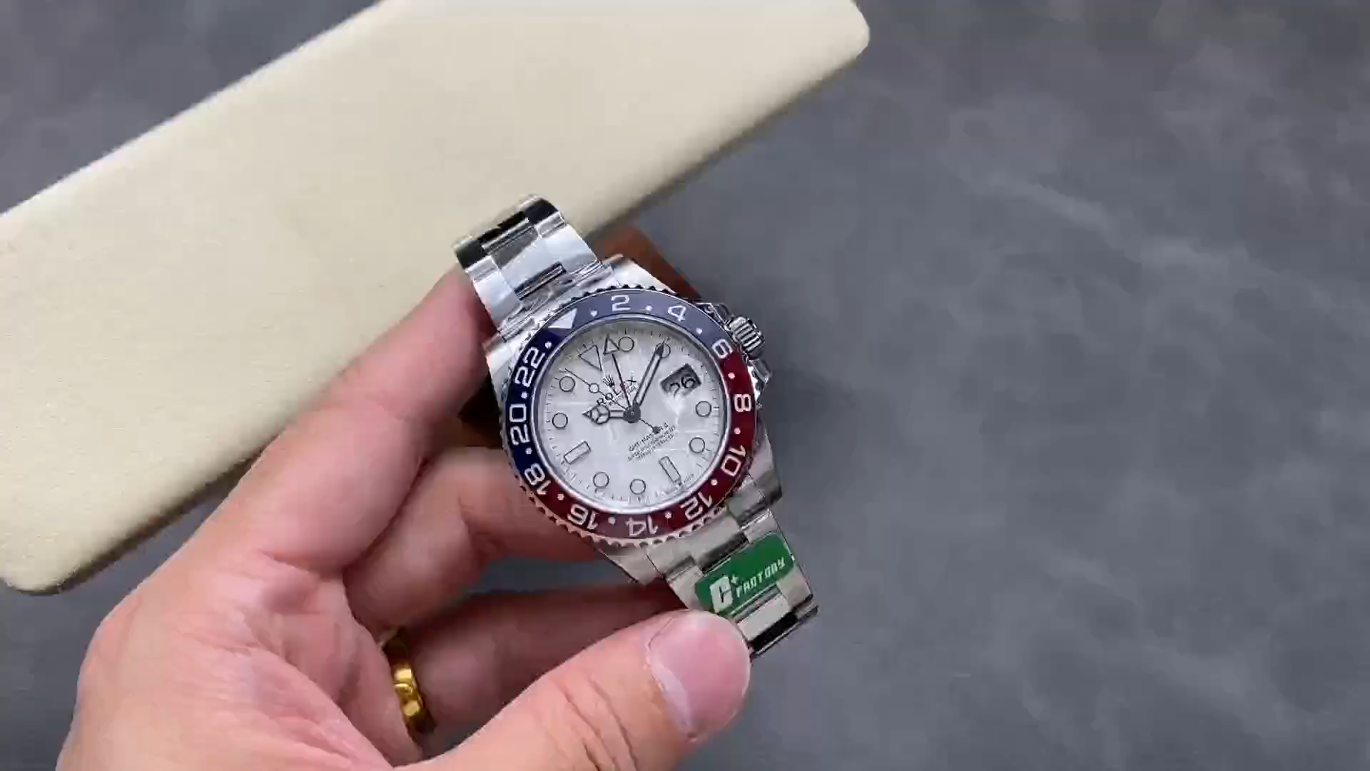 Rolex GMT-Master II 126719 0002 video, meteorite dial and Pepsi bezel, held in hand.