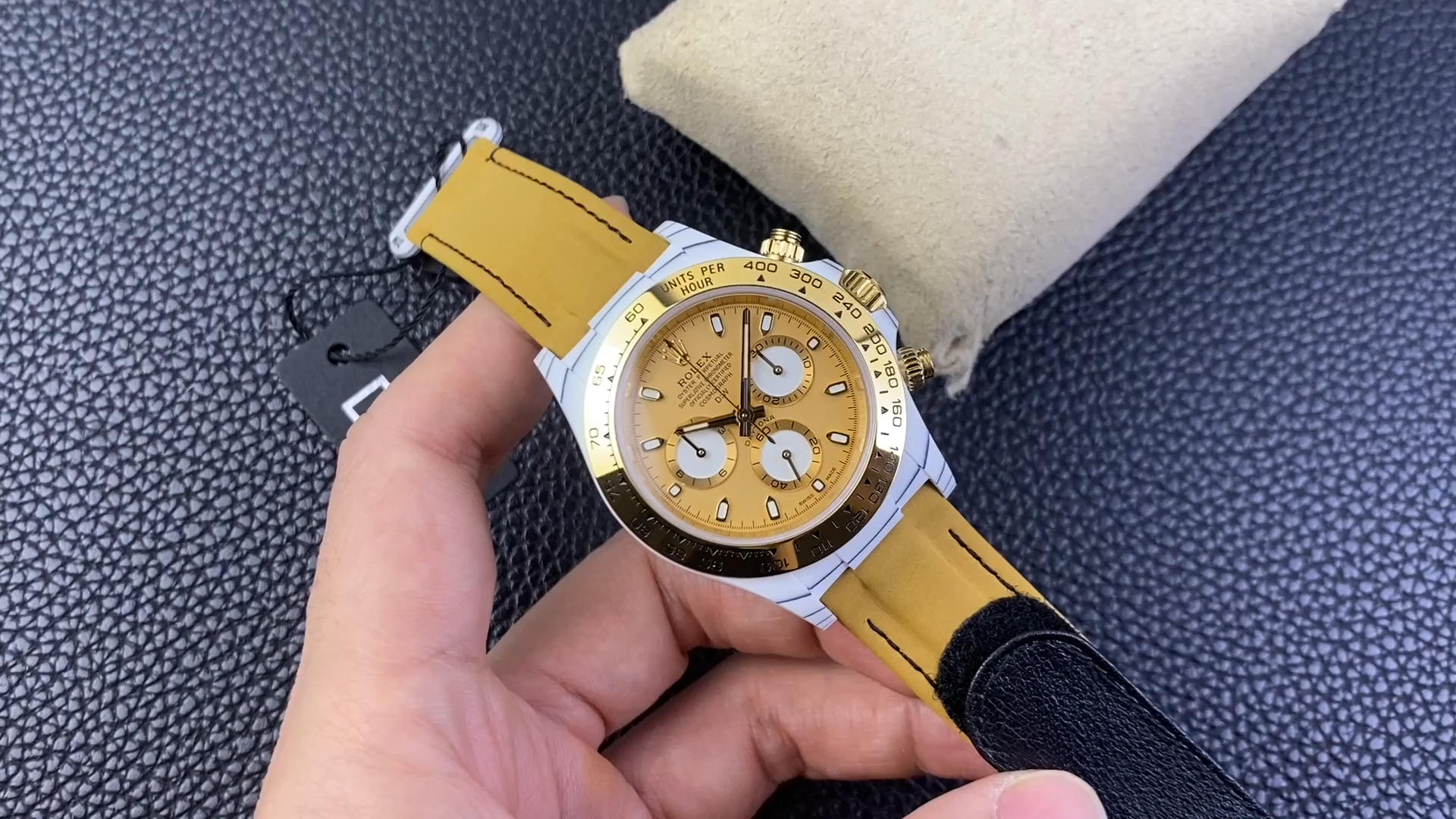 Rolex Daytona DiW Quartz Fiber Luminous 40mm, in-hand front view with yellow strap. - Video
