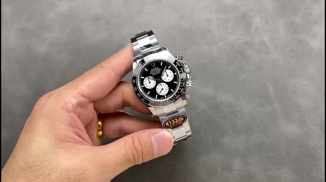 Hand-held video view of the Rolex Daytona 126529LN 40MM, dial and bezel visible. - Video