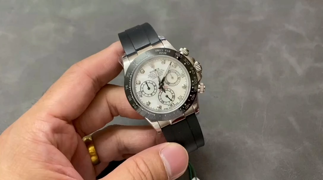 Video of Rolex Daytona 116519 showing mother-of-pearl dial and black strap. - Video