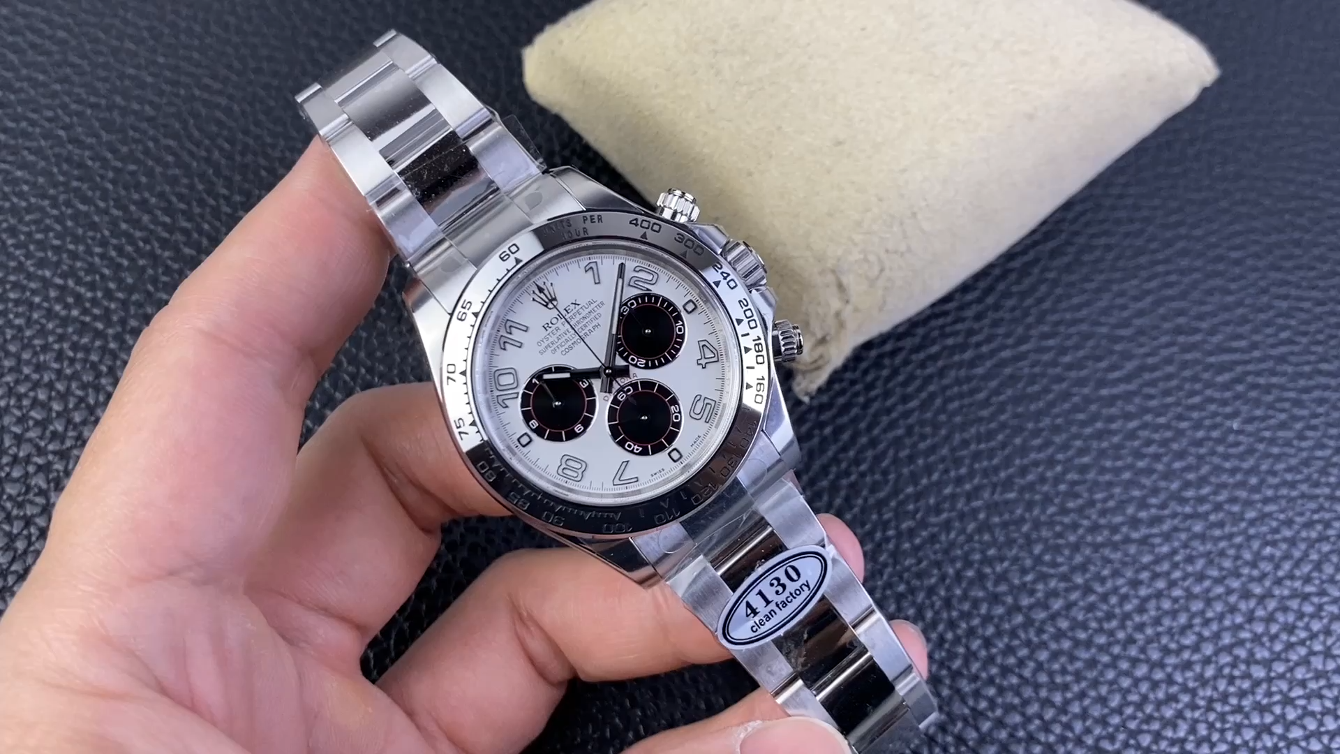 Hand-held video view of the Rolex Cosmograph Daytona 116509 40MM, white Arabic dial in frame. - Video