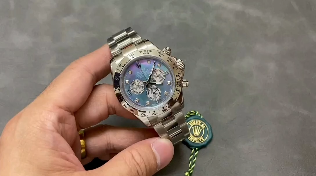 Video of Rolex Daytona 116509, hand-held shot showing pink dial and diamond bezel. - Video