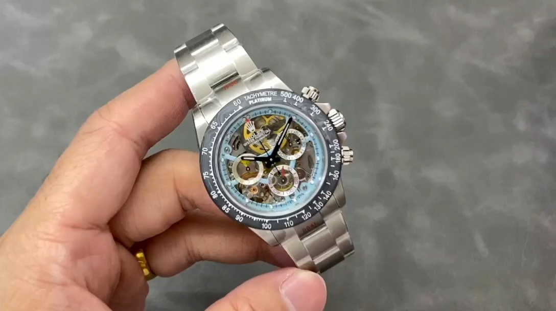 Hand-held video of Daytona 116500LN, showing the openworked dial and carbon bezel. - Video