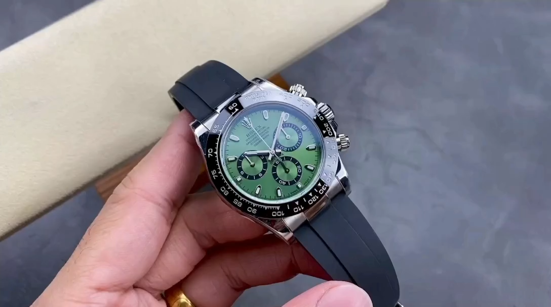 Rolex Daytona 126506, video of watch held in hand showing green dial and black bezel. - Video