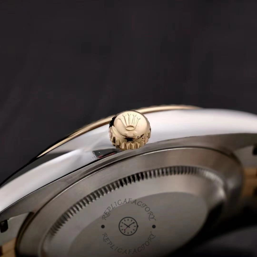 Side profile of Rolex Datejust M126333-0012 showing crown detail and fluted bezel edge.