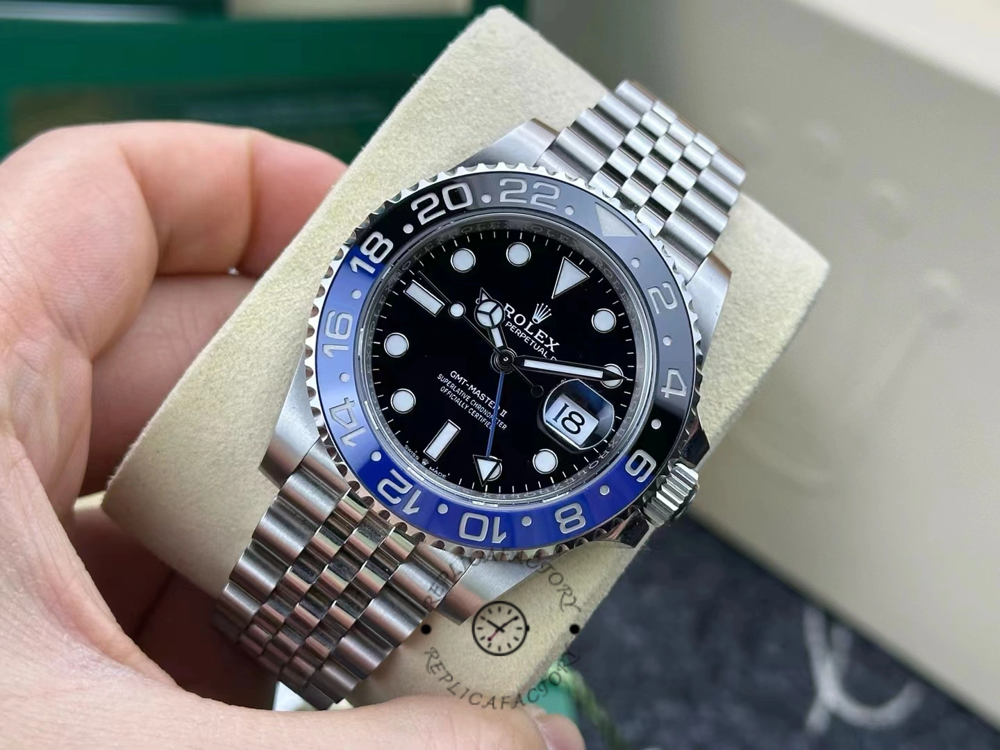 Angled front view of used Rolex GMT-Master II 126710BLNR-0002 showing minimal wear on the case and bracelet.
