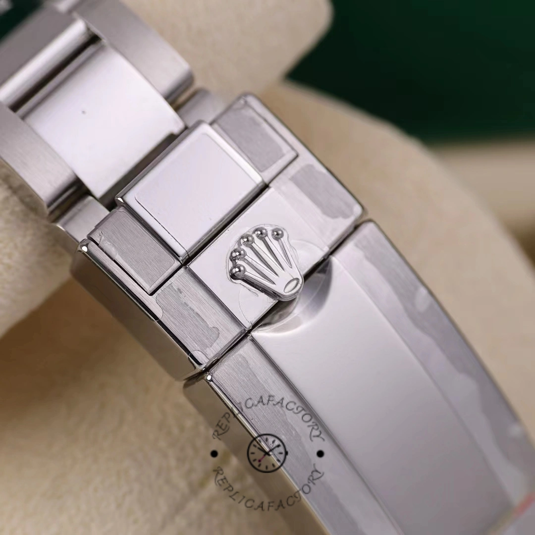 Bracelet clasp close-up of the Rolex GMT-Master II 126710BLRO 0002 showing Rolex coronet.