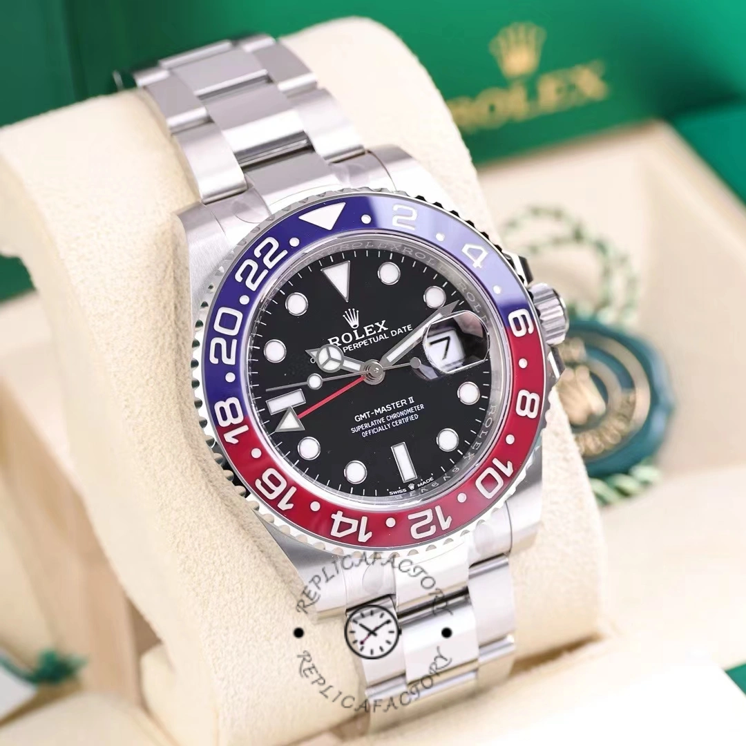 Front view of the Rolex GMT-Master II 126710BLRO 0002 on cushion, full bracelet shown.