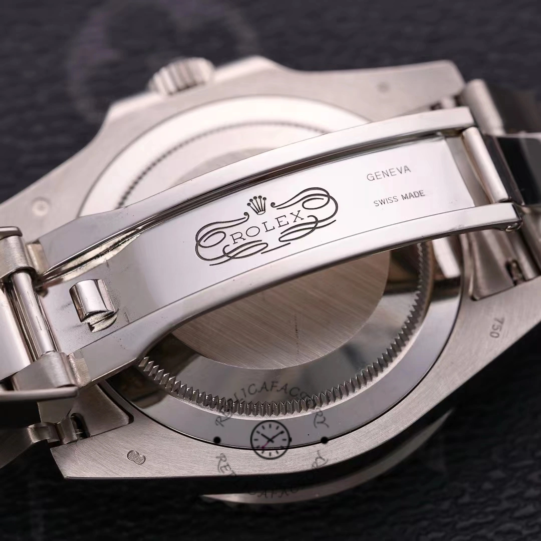 Rolex GMT-Master II 116719BLRO clasp close-up, Oyster bracelet clasp engraving detail.