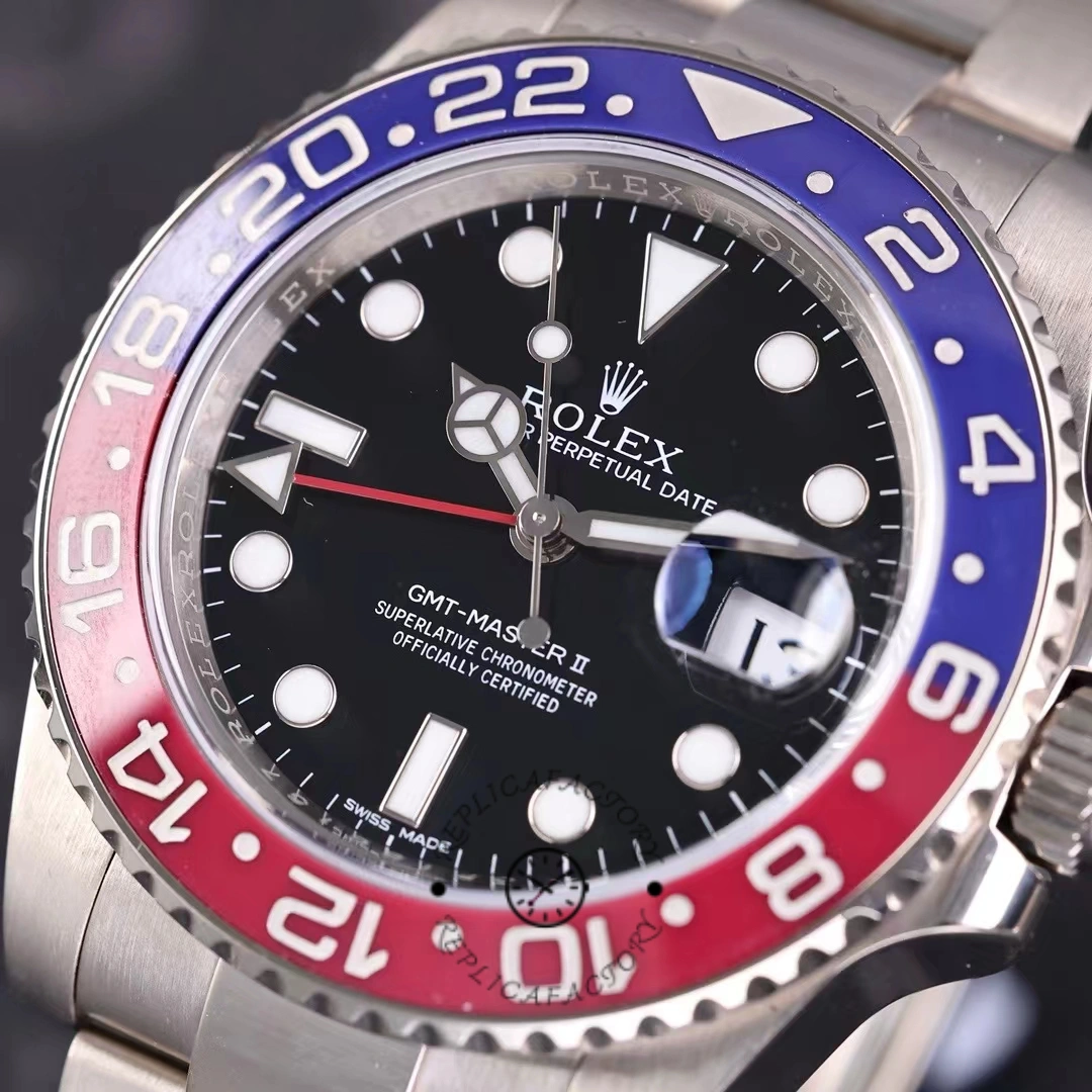 Rolex GMT-Master II 116719BLRO dial close-up, black dial and Pepsi bezel numerals, macro view.