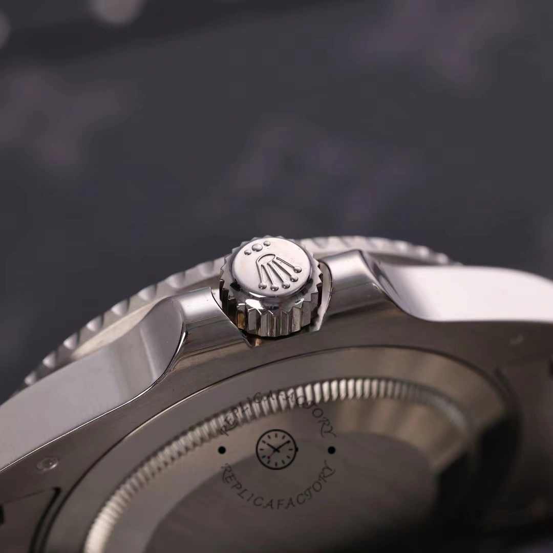 Rolex GMT-Master II 116719BLRO case back side close-up, crown and case thickness detail.