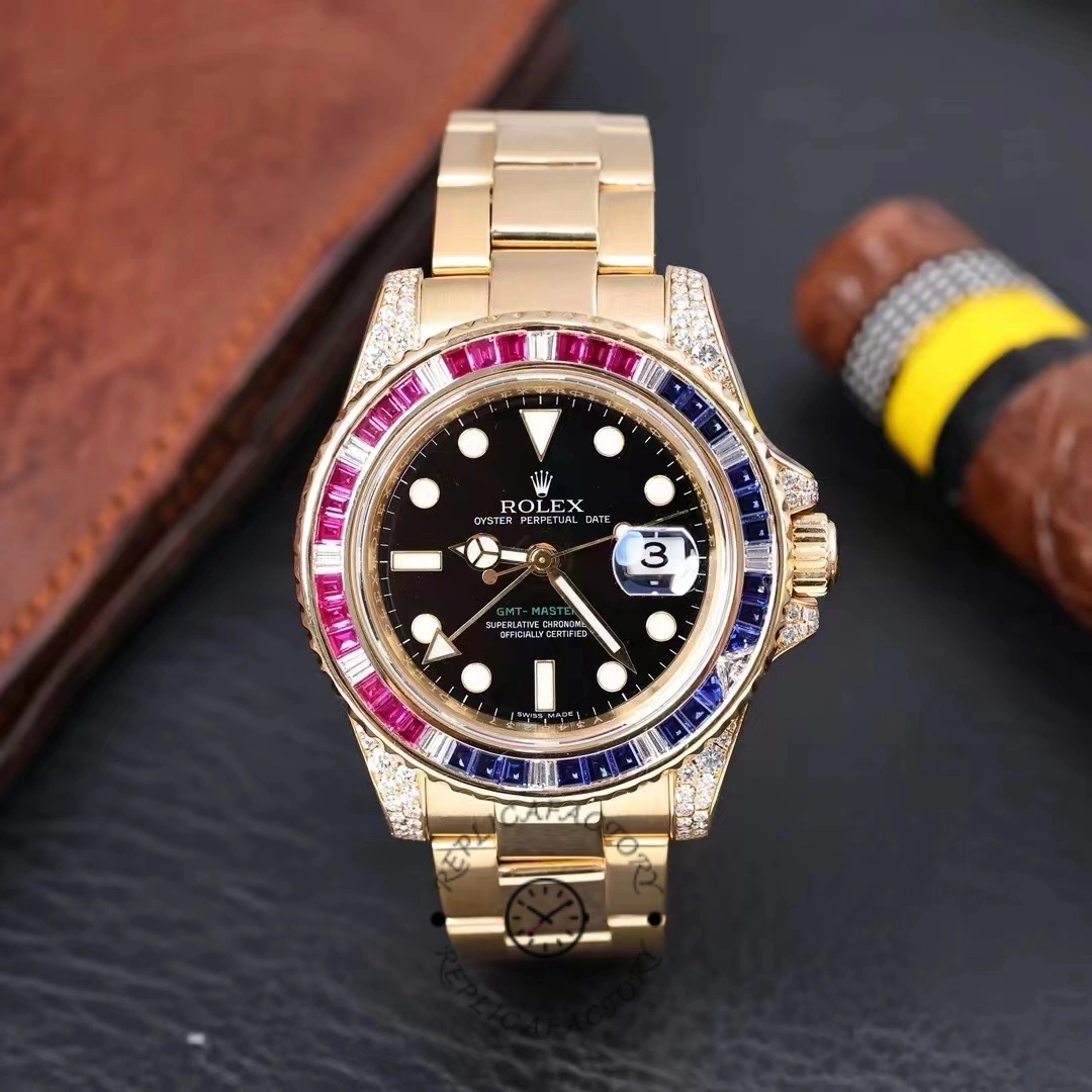 Rolex GMT-Master II 116758 on leather, black dial and gem bezel, yellow gold bracelet, front view.